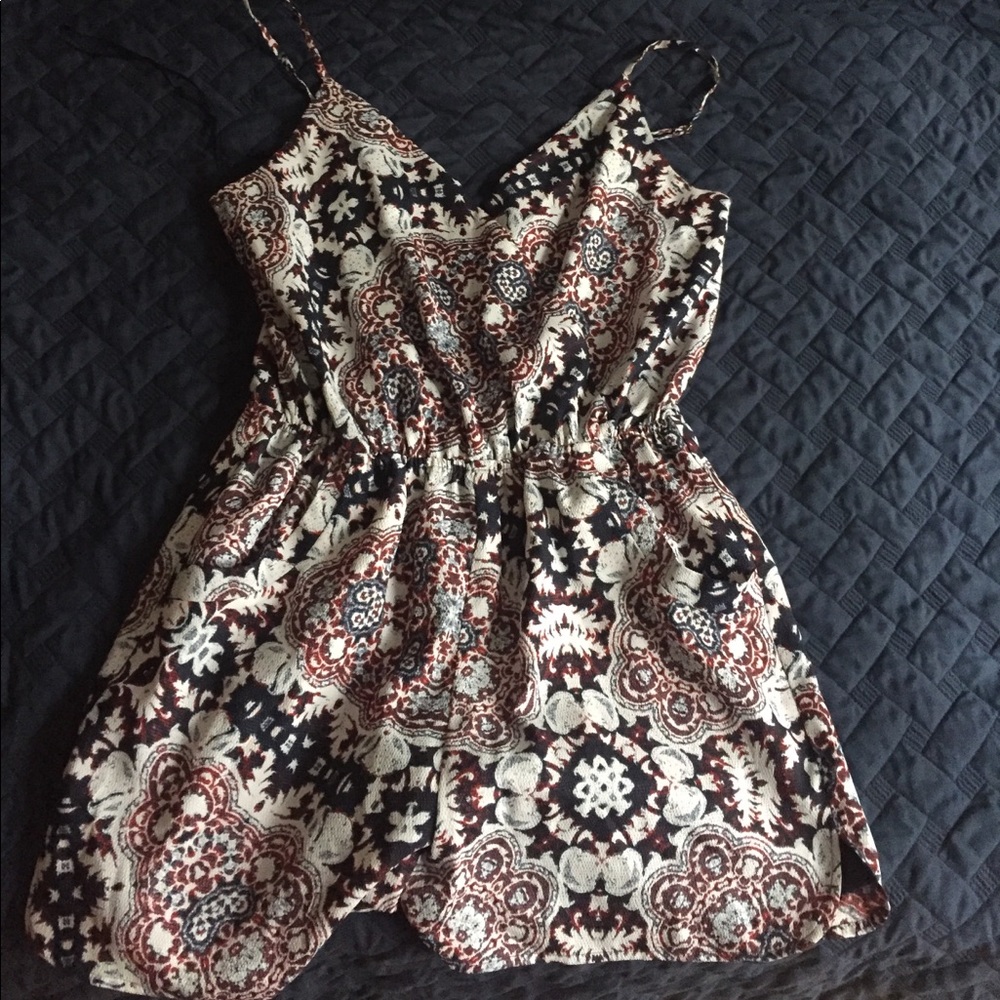 1. State medium printed romper.